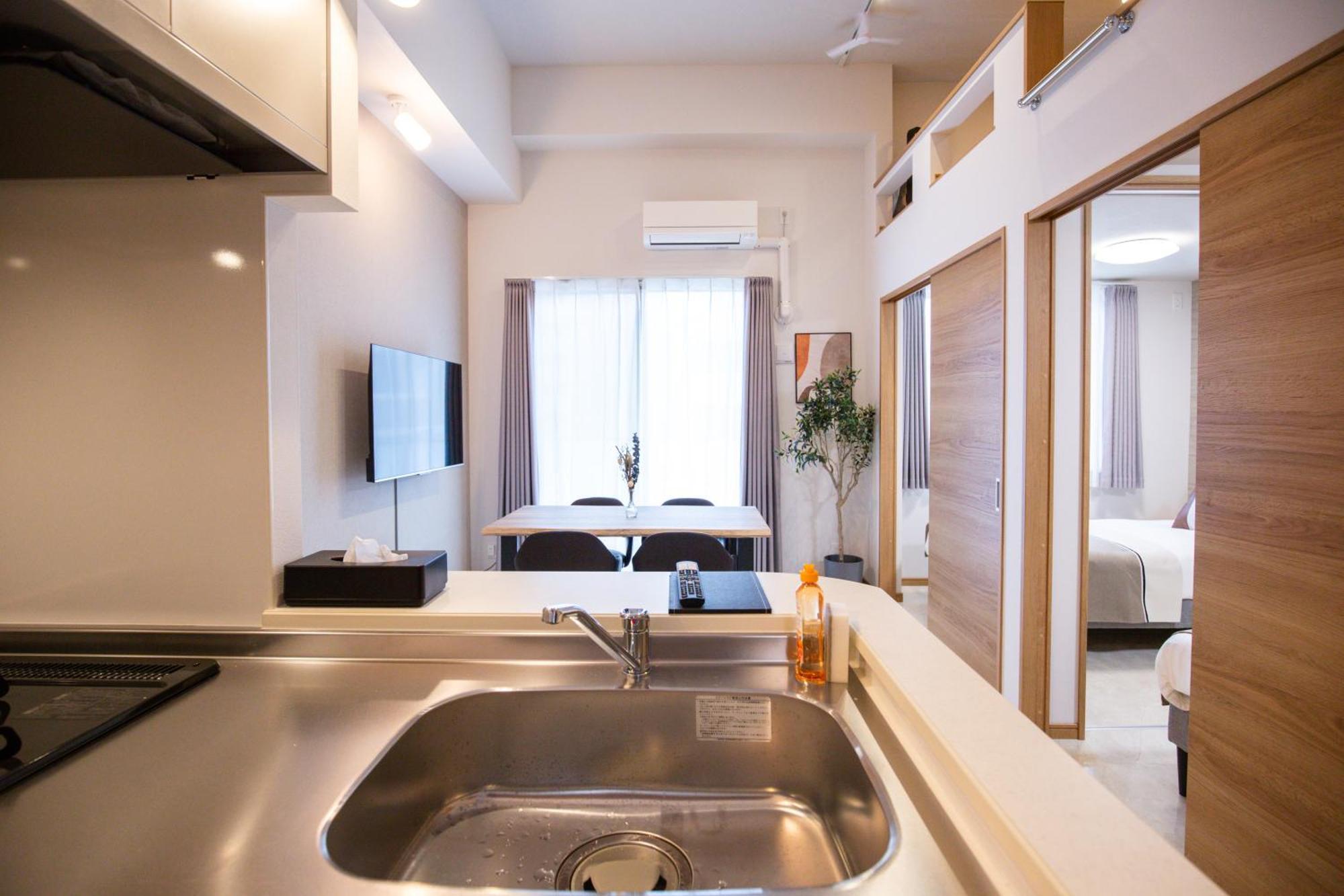 Ekimae Apartment *